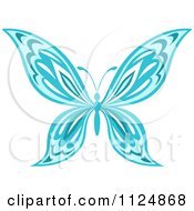 Clipart Of An Ornate Blue Butterfly Royalty Free Vector Illustration