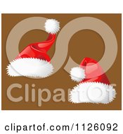 Clipart Of Two Christmas Santa Hats On Brown Royalty Free Vector Illustration