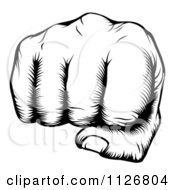 Clipart Of A Black And White Woodblock Fist Royalty Free Vector Illustration by AtStockIllustration
