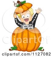 Poster, Art Print Of Boy In A Skeleton Costume Popping Out Of A Halloween Pumpkin
