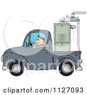 Worker Driving A Truck With A Furnace In The Bed