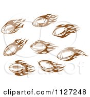 Clipart Of Brown American Footballs With Tribal Flames Royalty Free Vector Illustration