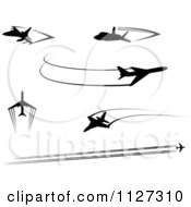 Poster, Art Print Of Black Silhouetted Airplanes And Trails