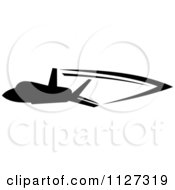 Clipart Of A Black Silhouetted Airplane And Trails 7 Royalty Free Vector Illustration