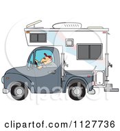 Man Driving A Pickup With A Camper