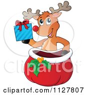 Poster, Art Print Of Cute Reindeer Holding A Gift Over A Sack