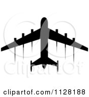 Poster, Art Print Of Black Silhouetted Airplane And Contrails 3