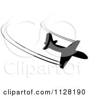 Clipart Of A Black Silhouetted Airplane And Contrails 6 Royalty Free Vector Illustration