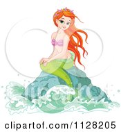 Cartoon Of A Beautiful Red Haired Mermaid On A Rock Royalty Free Vector Clipart by Pushkin
