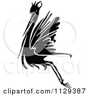 Clipart Of A Retro Vintage Black And White Flying Stork Royalty Free Vector Illustration