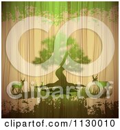 Clipart Of A Tree With Deer On Wood With Green Grunge Royalty Free Vector Illustration by merlinul