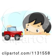 Poster, Art Print Of Asian Boy Playing With A Car On A Table