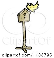 Cartoon Of A Yellow Bird And House Royalty Free Vector Clipart