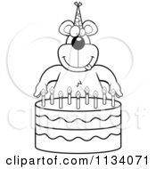 Cartoon Clipart Of An Outlined Bear Making A Wish Over Candles On A Birthday Cake Black And White Vector Coloring Page