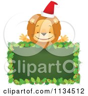 Poster, Art Print Of Happy Christmas Lion Over A Holly Sign