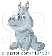 Cartoon Of A Cute Rhino Sitting Royalty Free Vector Clipart