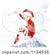 Poster, Art Print Of Christmas Fairy Using A Magic Wand And Sitting In Snow