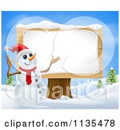 Clipart Of A Christmas Snowman Presenting A Wooden Sign Royalty Free Vector Illustration