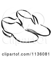 Clipart Of A Retro Vintage Black And White Pair Of Shoes Royalty Free Vector Illustration