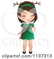 Giggling Christmas Girl In A Green Dress And Antlers