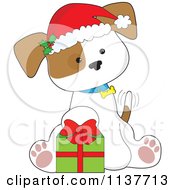 Poster, Art Print Of Cute Christmas Puppy With A Santa Hat And Present