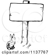 Clipart Of A Retro Vintage Black And White Bunny Under A Sign Royalty Free Vector Illustration