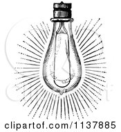 Clipart Of A Retro Vintage Black And White Shining Light Bulb Royalty Free Vector Illustration