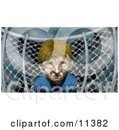 Miserable Little Boy By A Chainlink Fence On A Playground On A Stormy Day