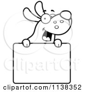 Cartoon Clipart Of An Outlined Happy Dog Over A Sign Black And White Vector Coloring Page