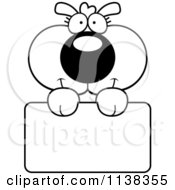 Cartoon Clipart Of An Outlined Cute Dog Holding A Sign Black And White Vector Coloring Page