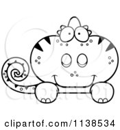 Cartoon Clipart Of An Outlined Cute Chameleon Lizard Looking Over A Sign Black And White Vector Coloring Page