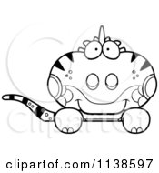 Cartoon Clipart Of An Outlined Clipart Cute Iguana Lizard Hanging Over A Sign Black And White Vector Coloring Page