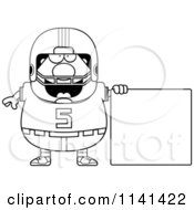 Cartoon Clipart Of A Black And White Chubby Football Player With A Sign Vector Outlined Coloring Page