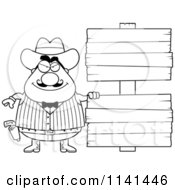 Black And White Happy Chubby Male Wild West Cowboy With A Wooden Sign