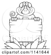 Poster, Art Print Of Black And White Baboon Monkey Behind A Wooden Sign