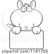 Cartoon Clipart Of A Black And White Aardvark Holding A Sign Vector Outlined Coloring Page