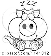 Cartoon Clipart Of A Black And White Baby Triceratops Sleeping Vector Outlined Coloring Page