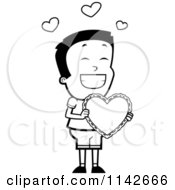 Cartoon Clipart Of A Black And White Romantic Boy Holding A Valentine Heart Vector Outlined Coloring Page