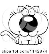 Cartoon Clipart Of A Black And White Sitting Kitten Vector Outlined Coloring Page