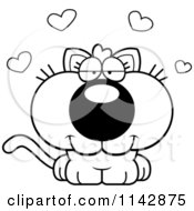 Cartoon Clipart Of A Black And White Loving Kitten Vector Outlined Coloring Page