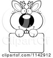 Cartoon Clipart Of A Black And White Cute Jackalope Holding A Sign Vector Outlined Coloring Page