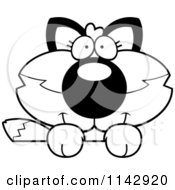 Cartoon Clipart Of A Black And White Cute Fox Over A Surface Vector Outlined Coloring Page