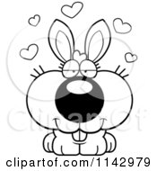 Cartoon Clipart Of A Black And White Loving Rabbit Vector Outlined Coloring Page
