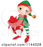 Poster, Art Print Of Cute Christmas Elf Boy Carrying A Big Present