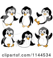 Cartoon Of Cute Little Penguins Royalty Free Vector Clipart
