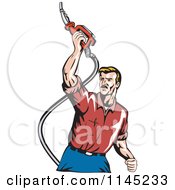 Clipart Of A Retro Man Holding Up A Gas Pump Fuel Nozzle Royalty Free Vector Illustration