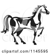 Clipart Of A Black And White Horse In Profile Royalty Free Vector Illustration