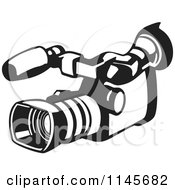 Clipart Of A Retro Black And White Video Camera Royalty Free Vector Illustration