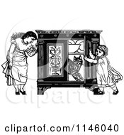 Clipart Of Retro Vintage Black And White Girls And Cat Playing With A Cupboard Royalty Free Vector Illustration