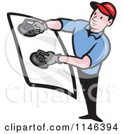 Glass Installer Holding A Windshield